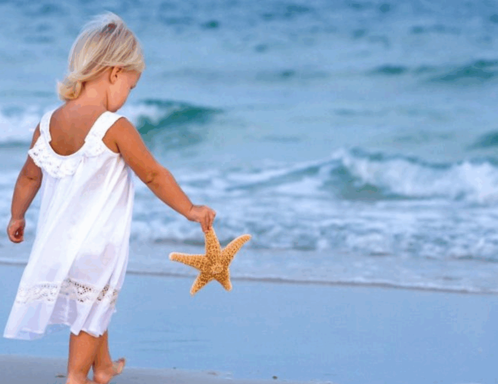 girl with starfish main image